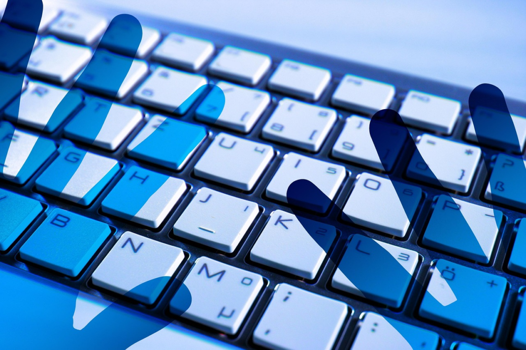hand shadows on keyboard