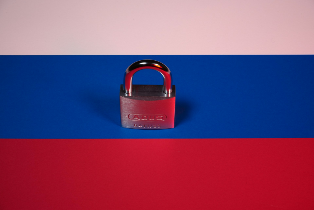 Russia flag with padlock on top