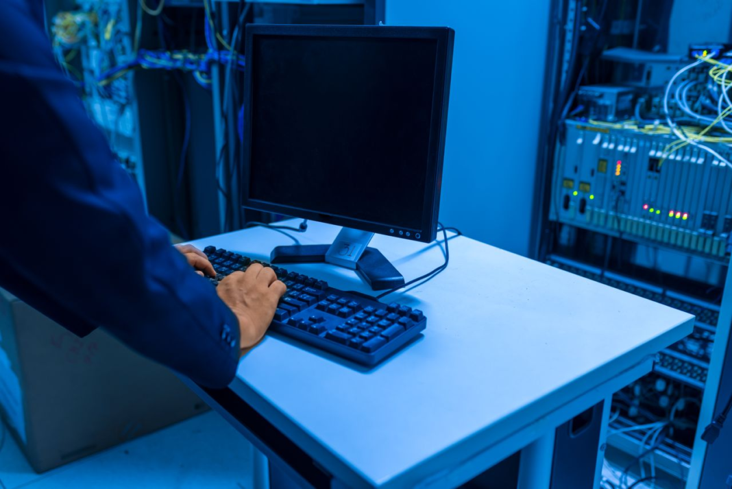 person typing on computer